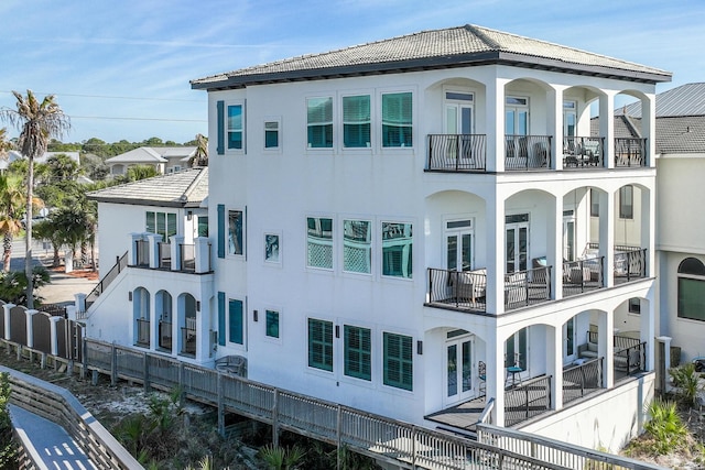 view of property exterior featuring a balcony