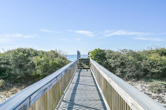 surrounding community featuring a water view