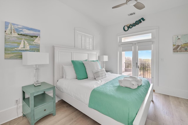 bedroom with french doors, access to outside, ceiling fan, and light hardwood / wood-style floors