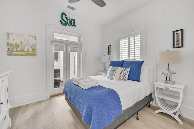 bedroom featuring light hardwood / wood-style flooring and ceiling fan