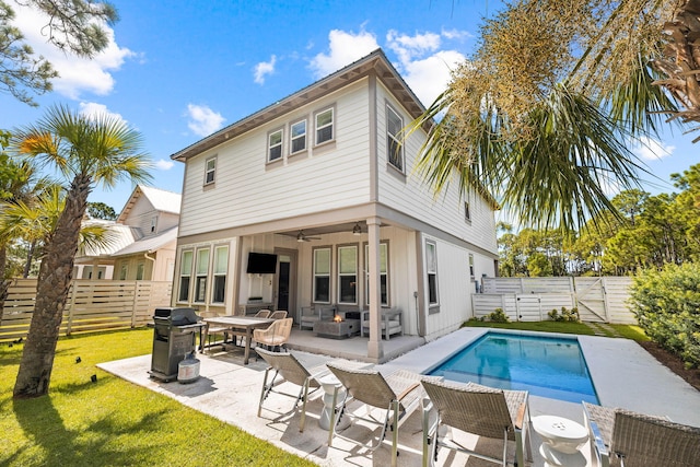 61 Shelleys Way, Miramar Beach, FL 32550 - rear view of property with a gate, a patio area, and a ceiling fan