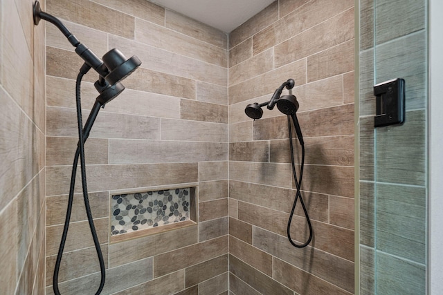 details featuring a tile shower