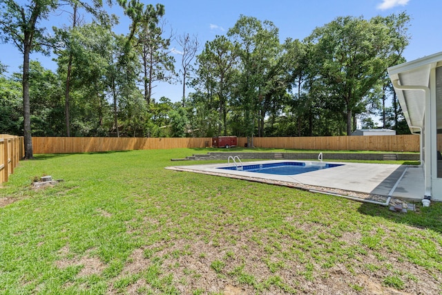 view of yard featuring a fenced in pool and a patio area