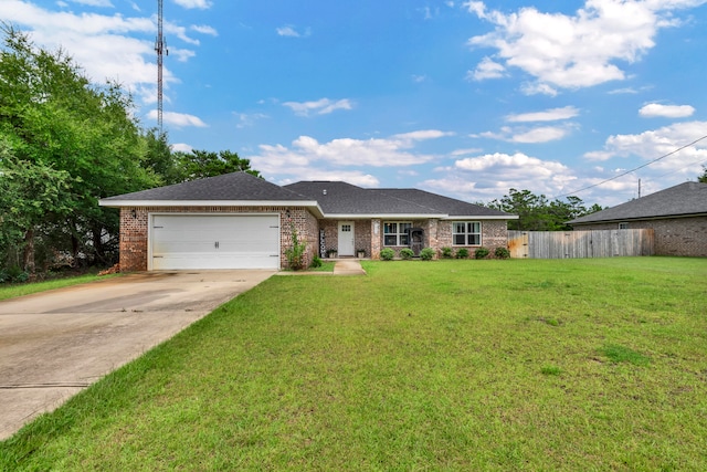 ranch-style home featuring a garage and a front yard