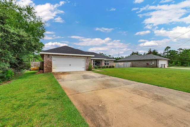 ranch-style house with a garage and a front yard