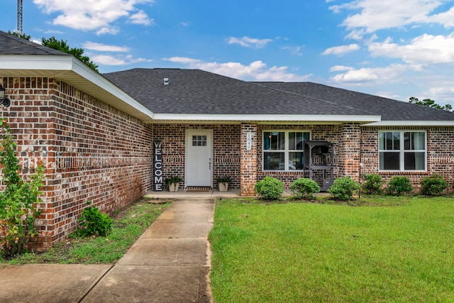 exterior space featuring a front lawn