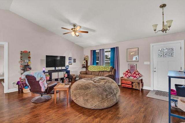 living room with lofted ceiling, ceiling fan with notable chandelier, and dark hardwood / wood-style flooring