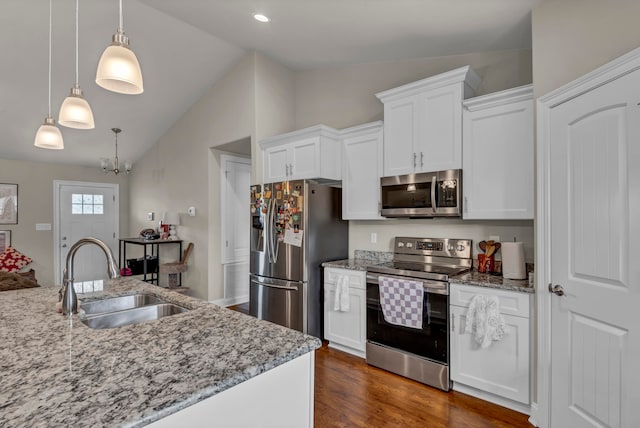 kitchen featuring sink, white cabinets, dark hardwood / wood-style floors, and stainless steel appliances