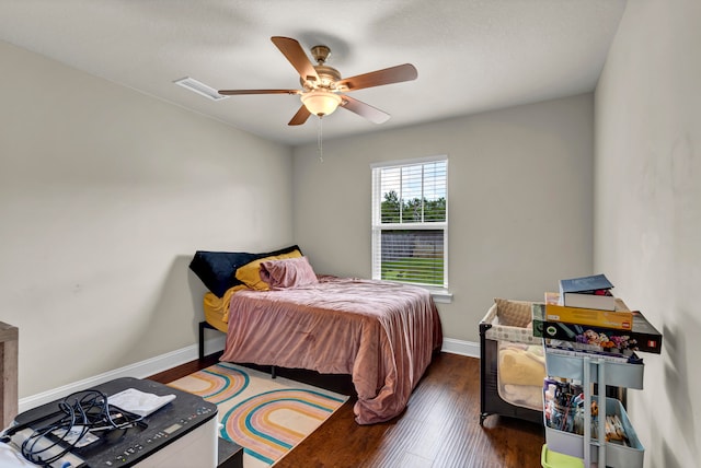 bedroom featuring wood-type flooring and ceiling fan