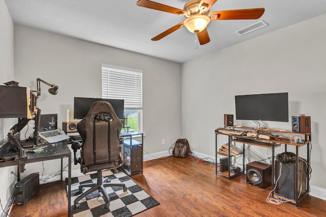 office space featuring hardwood / wood-style flooring and ceiling fan