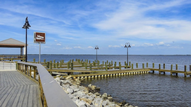 view of dock with a water view