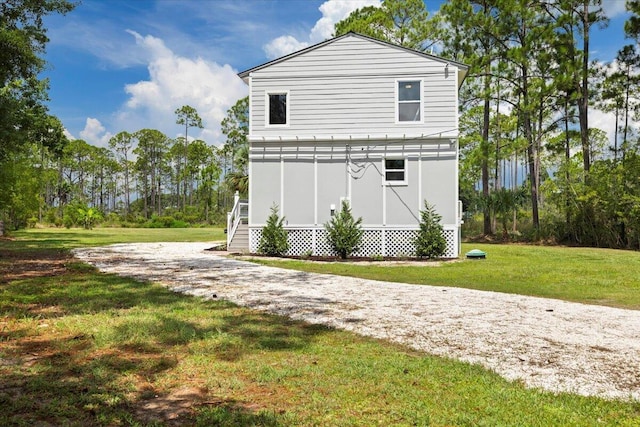 exterior space with a lawn