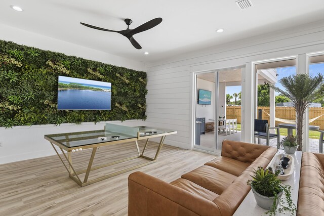 office featuring ceiling fan and light hardwood / wood-style floors