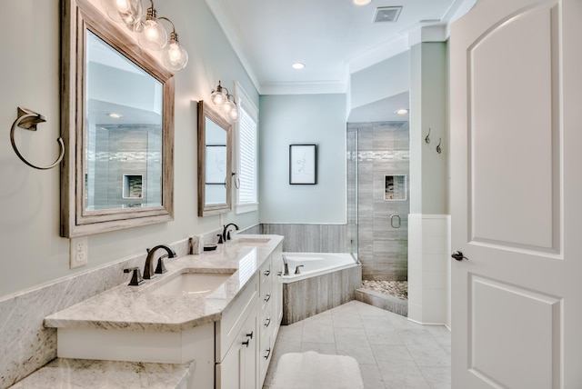 bathroom featuring vanity, separate shower and tub, and ornamental molding