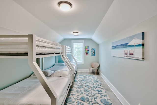 bedroom featuring vaulted ceiling