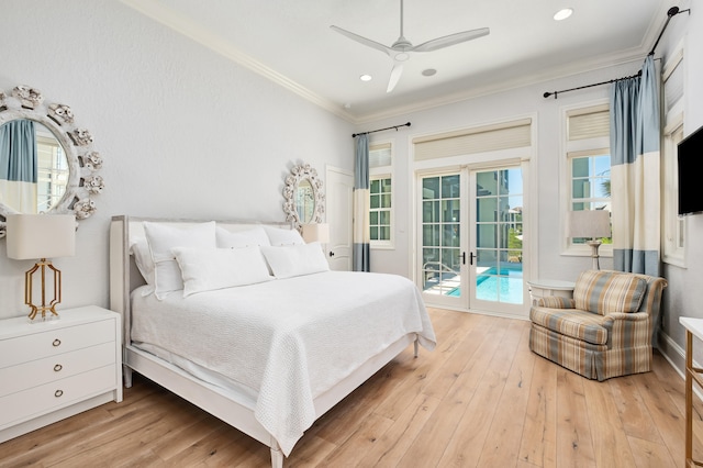 bedroom featuring light wood-type flooring, access to outside, multiple windows, and ceiling fan