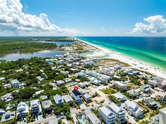 aerial view with a view of the beach and a water view