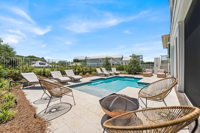 view of pool featuring a patio