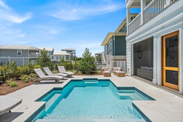 view of pool featuring a patio