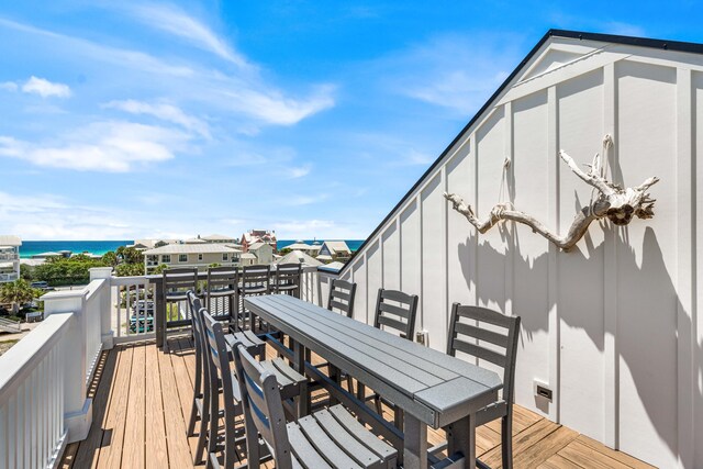 deck featuring a water view