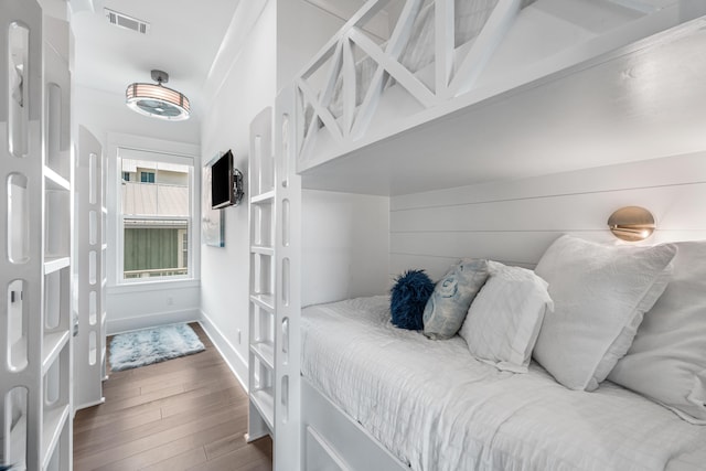 bedroom featuring hardwood / wood-style floors