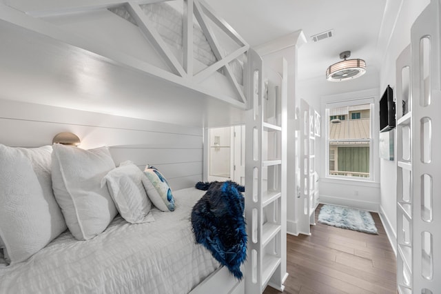 bedroom featuring wood-type flooring