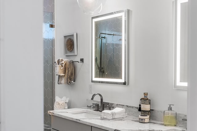 bathroom with vanity and a shower with shower curtain