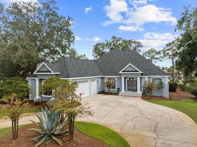 1780 Driftwood Point Rd, Santa Rosa Beach, FL 32459 - view of front of home with an attached garage, driveway, and roof with shingles