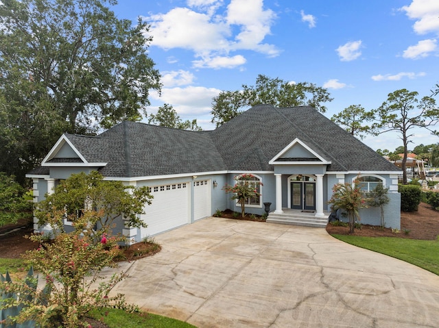 1780 Driftwood Point Rd, Santa Rosa Beach, FL 32459 - view of front of property with a garage, concrete driveway, and roof with shingles
