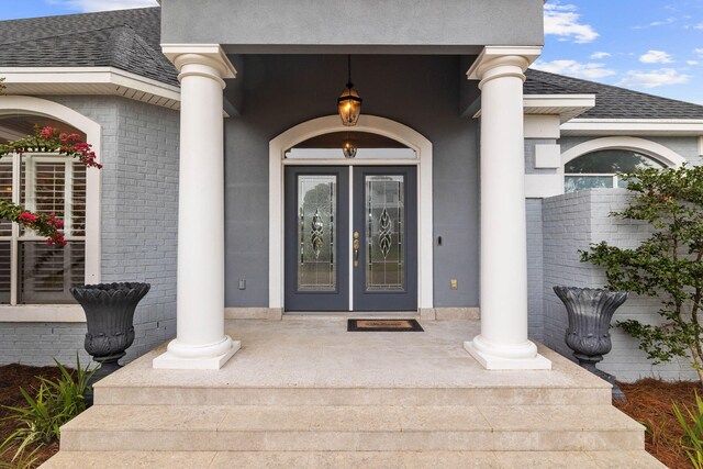 1780 Driftwood Point Rd, Santa Rosa Beach, FL 32459 - doorway to property featuring stucco siding, french doors, and roof with shingles