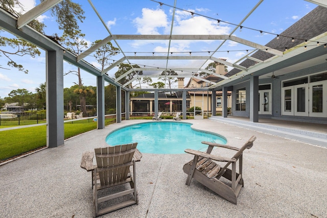 1780 Driftwood Point Rd, Santa Rosa Beach, FL 32459 - view of swimming pool featuring glass enclosure, a patio, a yard, and a fenced in pool