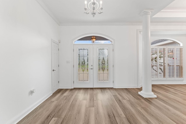 1780 Driftwood Point Rd, Santa Rosa Beach, FL 32459 - entrance foyer featuring baseboards, ornamental molding, french doors, an inviting chandelier, and wood finished floors