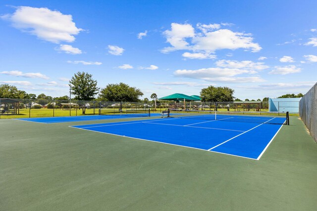 view of tennis court with basketball court