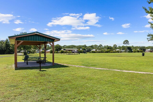 view of home's community featuring a gazebo and a yard