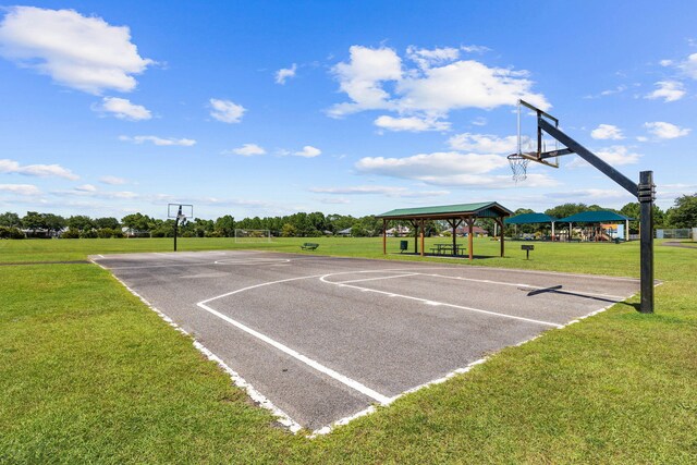 view of basketball court featuring a gazebo and a yard