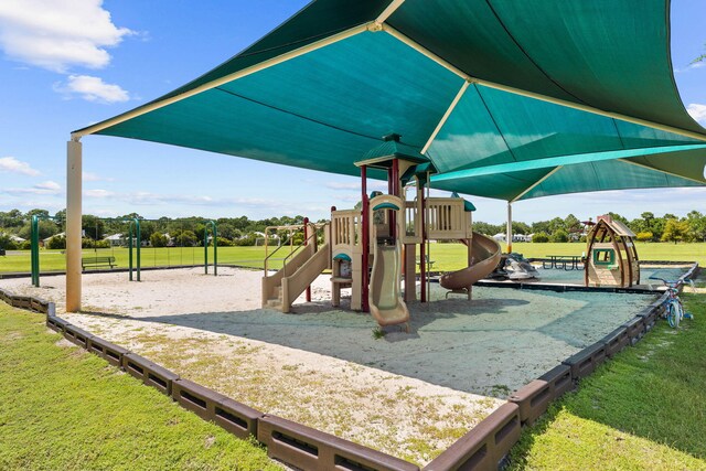 view of jungle gym with a yard