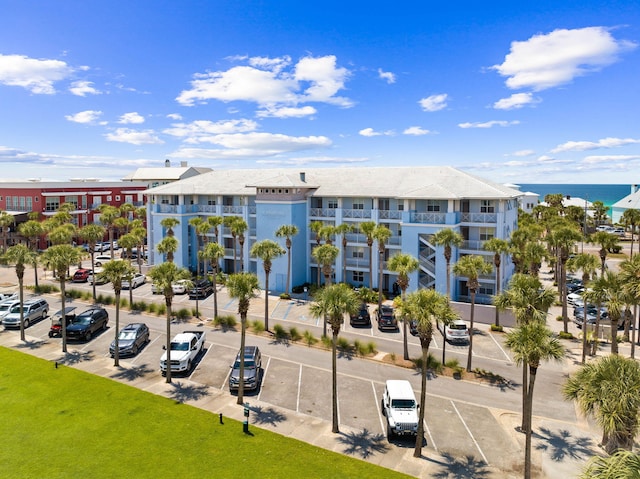 view of building exterior with a water view