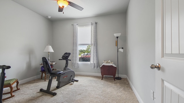 workout area featuring light carpet, plenty of natural light, and ceiling fan