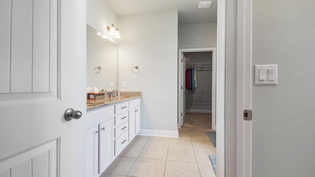 bathroom with vanity and tile patterned floors