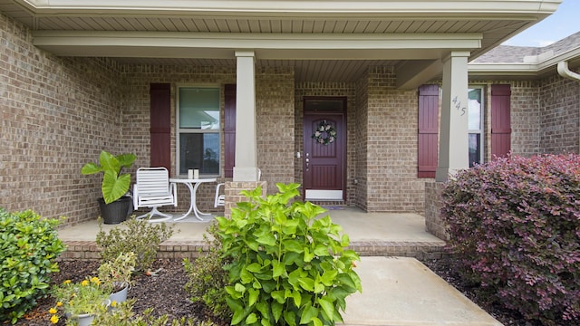 entrance to property with a porch