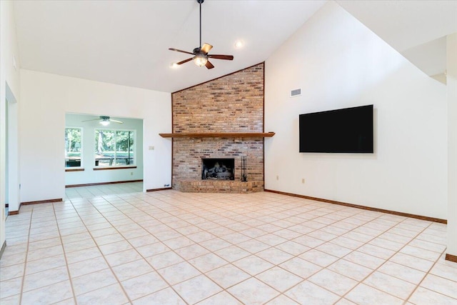 unfurnished living room featuring ceiling fan, light tile patterned floors, high vaulted ceiling, and a brick fireplace