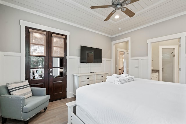 bedroom featuring ensuite bathroom, french doors, crown molding, wooden ceiling, and light hardwood / wood-style flooring