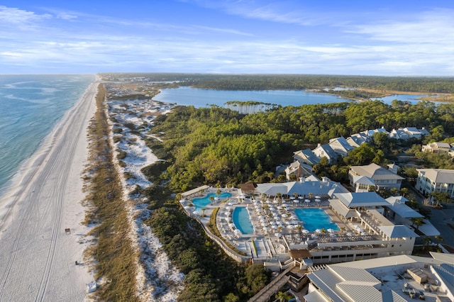 birds eye view of property featuring a view of the beach and a water view