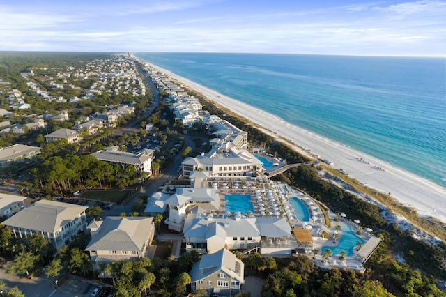 birds eye view of property featuring a view of the beach and a water view