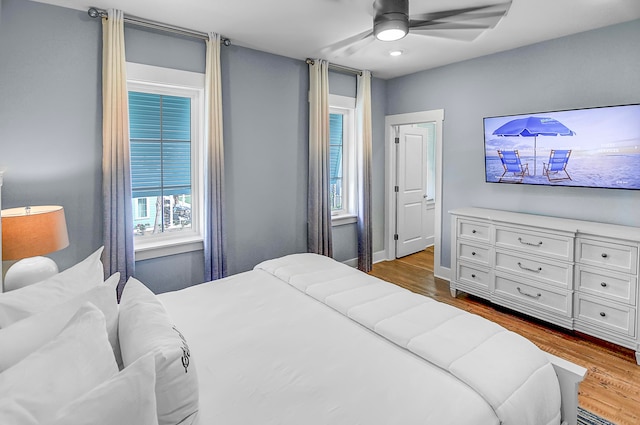 bedroom featuring ceiling fan and hardwood / wood-style floors