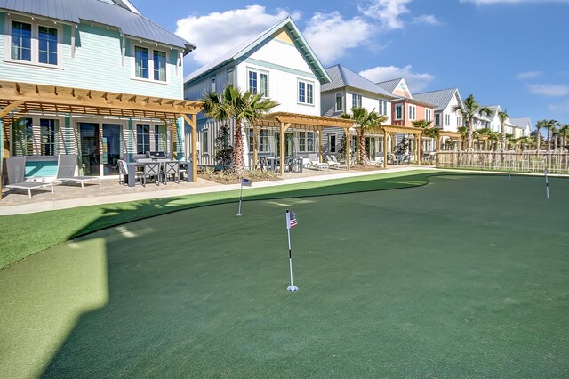 view of home's community with a patio