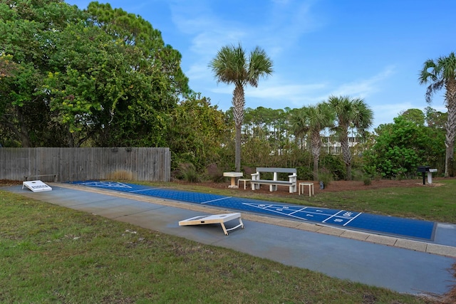 view of pool featuring a yard