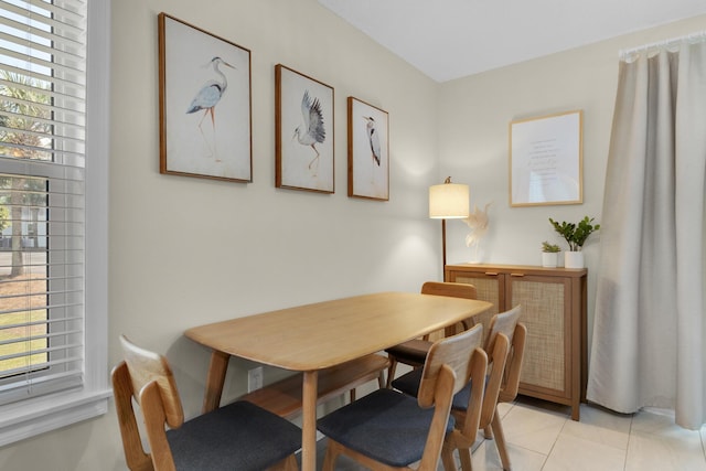 dining space with light tile patterned flooring