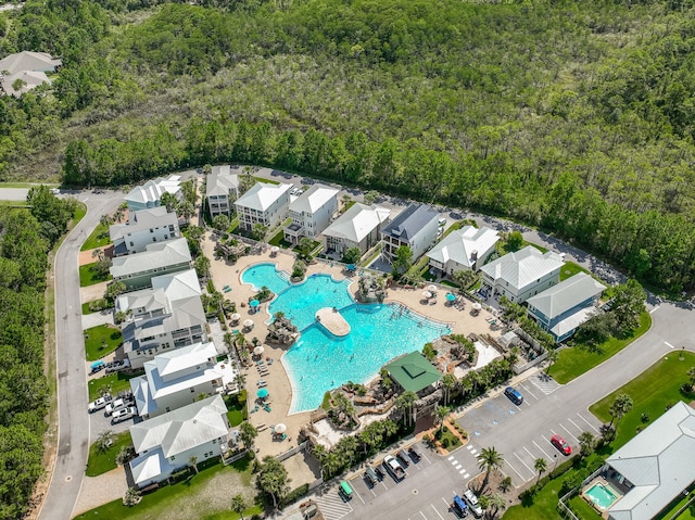61 Sweet Breeze Dr, Santa Rosa Beach, FL 32459 - bird's eye view of a pool area and a forest