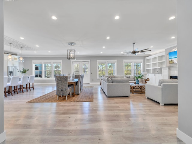 61 Sweet Breeze Dr, Santa Rosa Beach, FL 32459 - living room with recessed lighting, light wood-style flooring, baseboards, and a ceiling fan